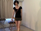 crossdresser wearing a mini skirt