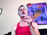 Daddy Richard Lennox smokes while taunting his stepson