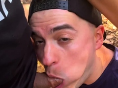 Outdoor gay blowjob action